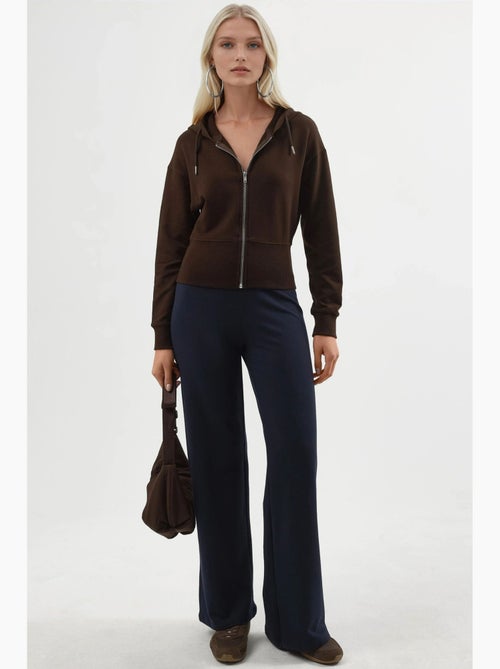 Chaqueta con cremallera y manga larga con capucha busem - Kiabi Chaqueta con cremallera y manga larga con capucha busem - Kiabi