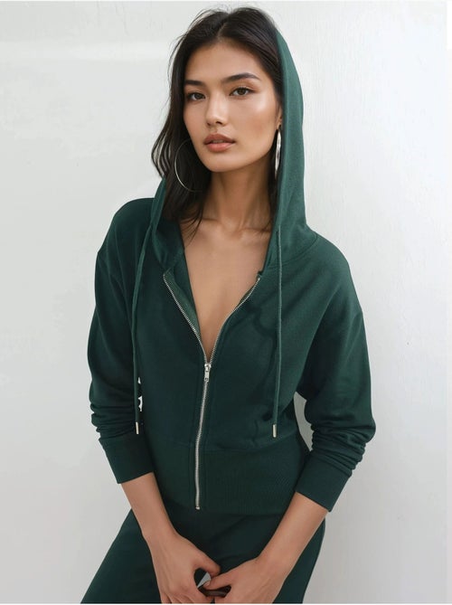 Chaqueta con cremallera y manga larga con capucha busem - Kiabi Chaqueta con cremallera y manga larga con capucha busem - Kiabi
