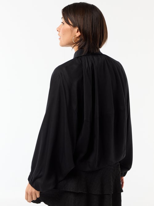 Chaqueta con cremallera y mangas abullonadas - Kiabi