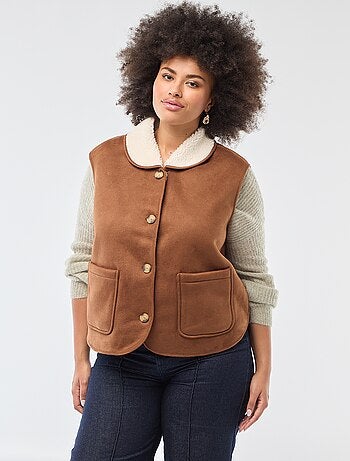 Chaqueta corta reversible sin mangas