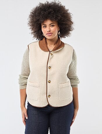 Chaqueta corta reversible sin mangas