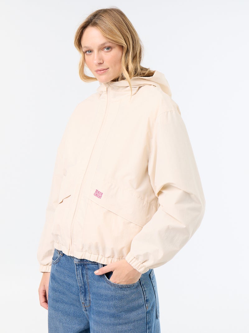 Chaqueta cortavientos con capucha Beige - Kiabi