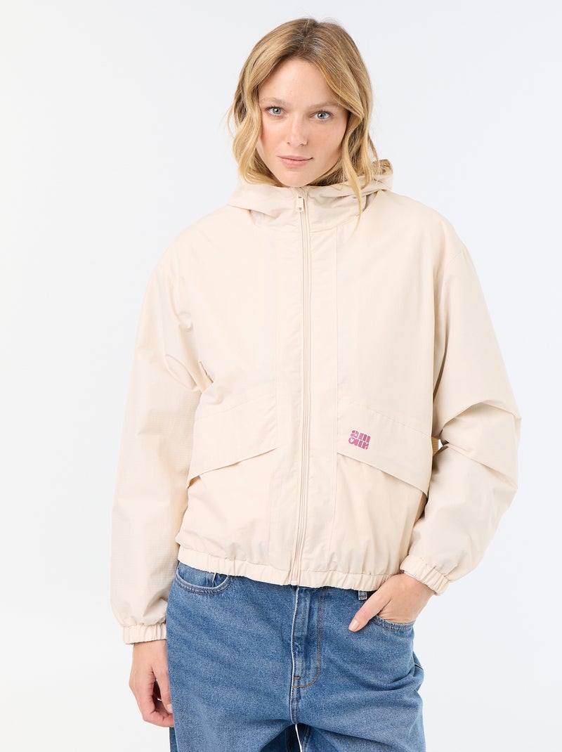 Chaqueta cortavientos con capucha Beige - Kiabi