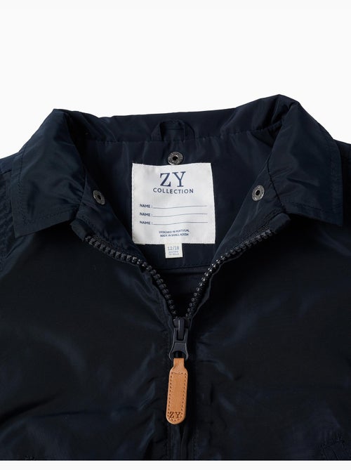 Chaqueta cortavientos con capucha desmontable - Kiabi