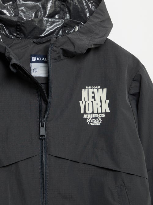 Chaqueta cortavientos con capucha - Kiabi