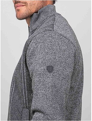 Chaqueta de punto con cremallera, cuello alto y motivo geométrico lideral