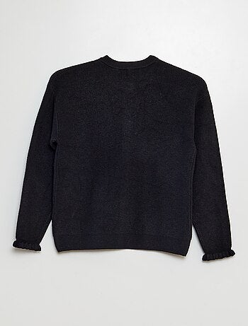 Chaqueta de punto con volantes en los puños