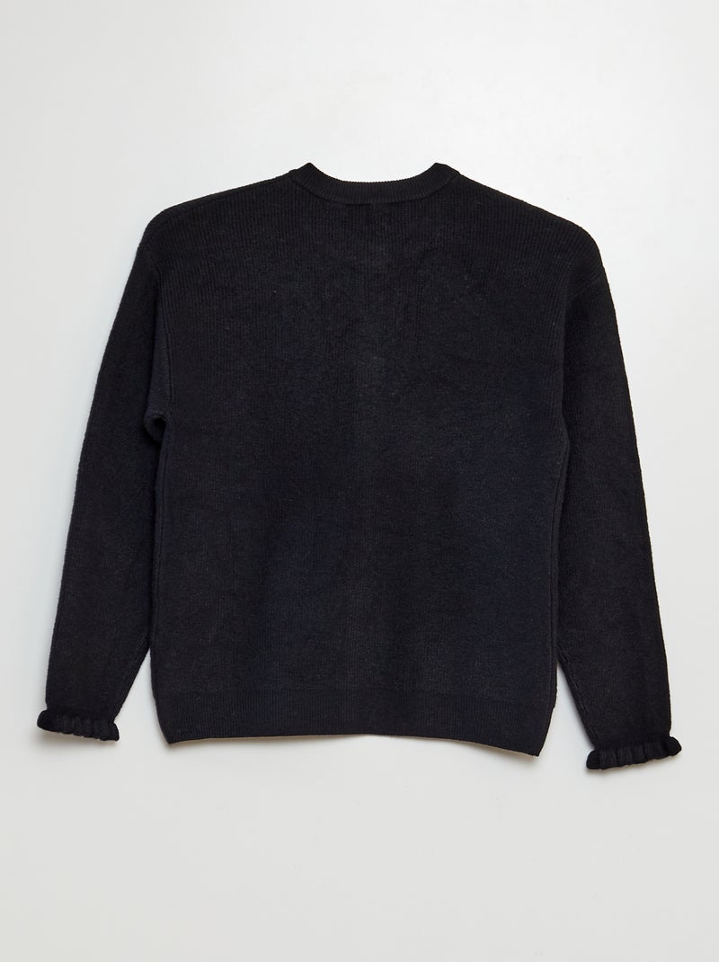 Chaqueta de punto con volantes en los puños negro - Kiabi