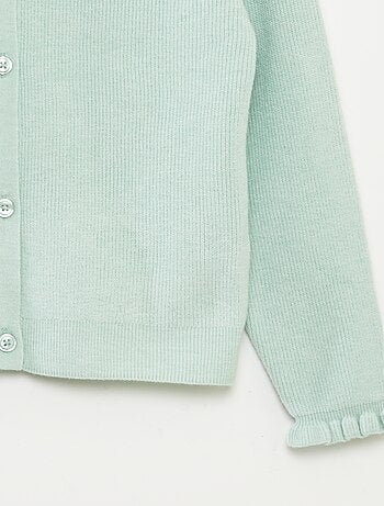 Chaqueta de punto con volantes en los puños