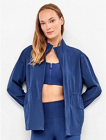 Chaqueta deportiva con cremallera y ajuste en cintura