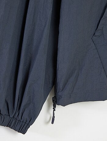 Chaqueta impermeable con capucha - colección fácil de poner