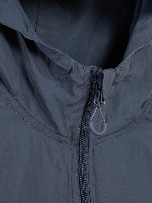 Chaqueta impermeable con capucha - colección fácil de poner - Kiabi