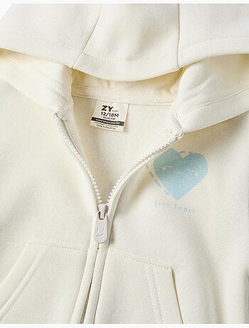 Chaqueta perchada con capucha y estampados de corazones