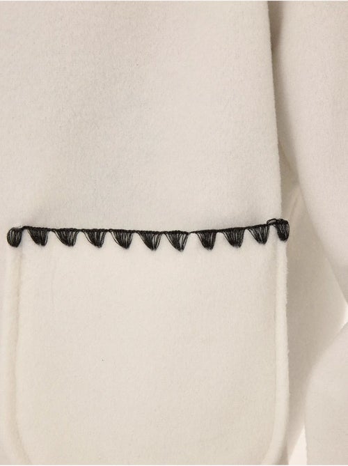 Chaqueta sin cuello con costura en contraste - Kiabi Chaqueta sin cuello con costura en contraste - Kiabi