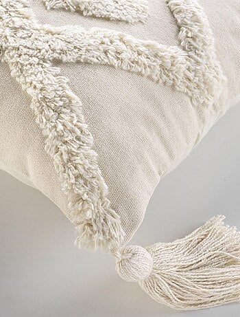 Cojín bohemio tufted con borlas