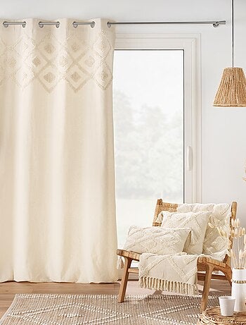 Cojín bohemio tufted con borlas