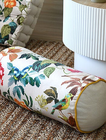 Cojín cilíndrico decorativo con estampado de hojas y pájaro