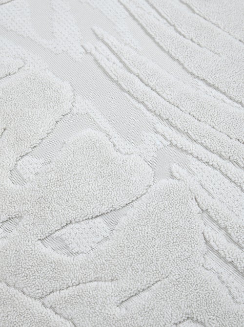 Cojín cuadrado efecto terciopelo con diseño tropical en relieve - Kiabi