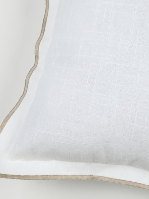 Cojín de algodón con efecto textura - Kiabi Cojín de algodón con efecto textura - Kiabi