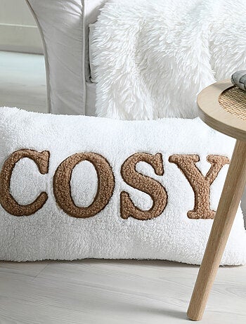 Cojín de forro polar con mensaje bordado "Cosy
