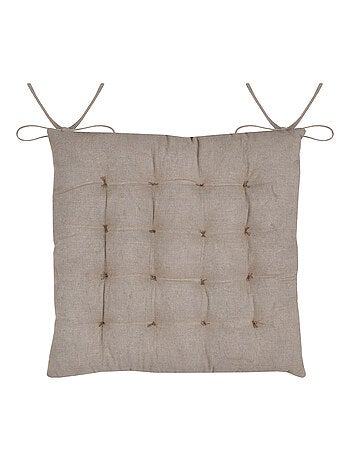Cojín de silla con hojas doradas para un interior elegante