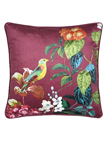 Cojín decorativo con estampado de hojas y pájaro