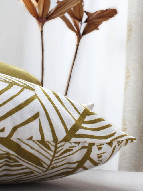 Cojín decorativo con estampado gráfico de hojas en algodón reciclado - Kiabi Cojín decorativo con estampado gráfico de hojas en algodón reciclado - Kiabi