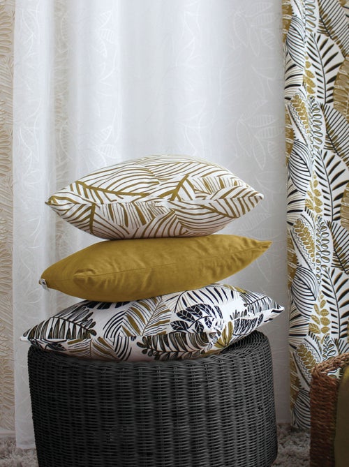 Cojín decorativo con estampado gráfico de hojas en algodón reciclado - Kiabi Cojín decorativo con estampado gráfico de hojas en algodón reciclado - Kiabi