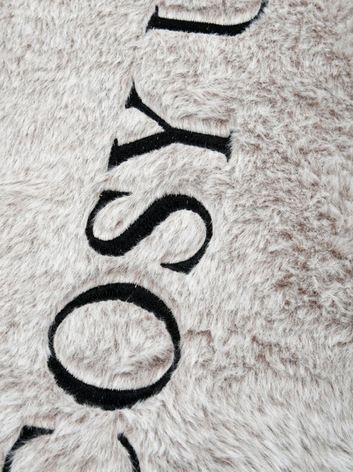 Cojín decorativo de tacto piel con mensaje bordado «Cosy up» - Kiabi
