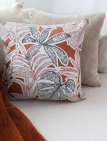 Cojín decorativo desenfundable con estampado de hojas tropicales