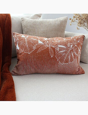 Cojín decorativo desenfundable con estampado de hojas tropicales