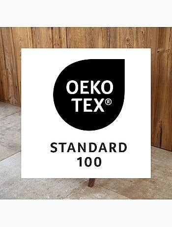 Cojín decorativo moteado con textura rizada y reverso de terciopelo