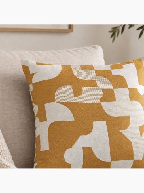 Cojín jacquard geométrico con textura retro - Kiabi Cojín jacquard geométrico con textura retro - Kiabi