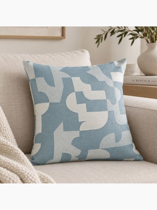 Cojín jacquard geométrico con textura retro - Kiabi Cojín jacquard geométrico con textura retro - Kiabi