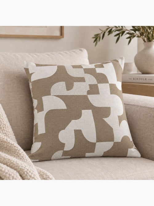 Cojín jacquard geométrico con textura retro - Kiabi Cojín jacquard geométrico con textura retro - Kiabi