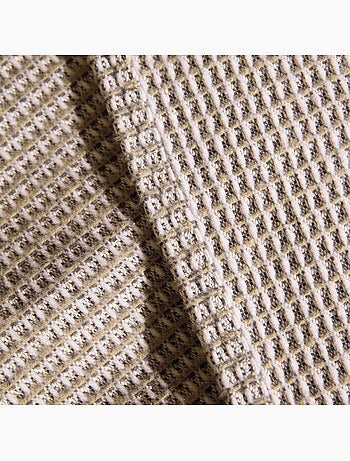Colcha tejida en algodón reciclado con motivo de nido de abeja