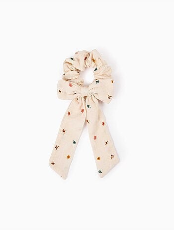 Coletero con lazo y estampado floral