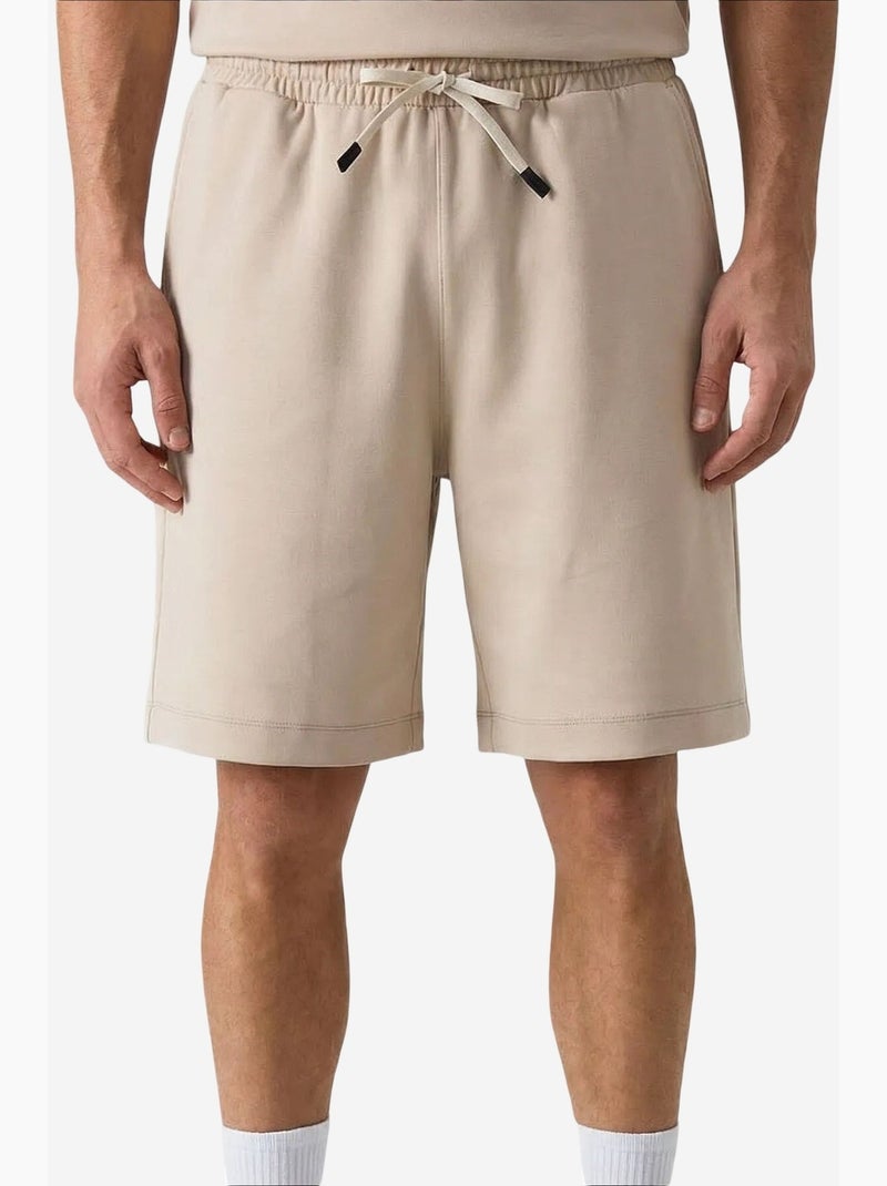 Conjunto active de hombre de poliéster-elastano tommy Beige arcilla - Kiabi