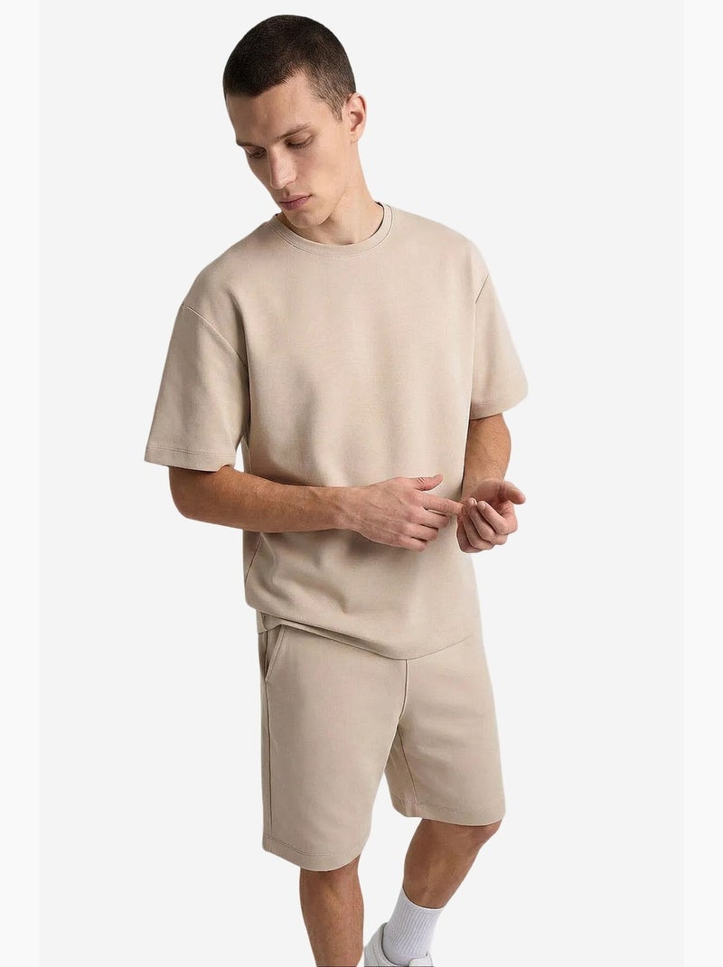 Conjunto active de hombre de poliéster-elastano tommy Beige arcilla - Kiabi