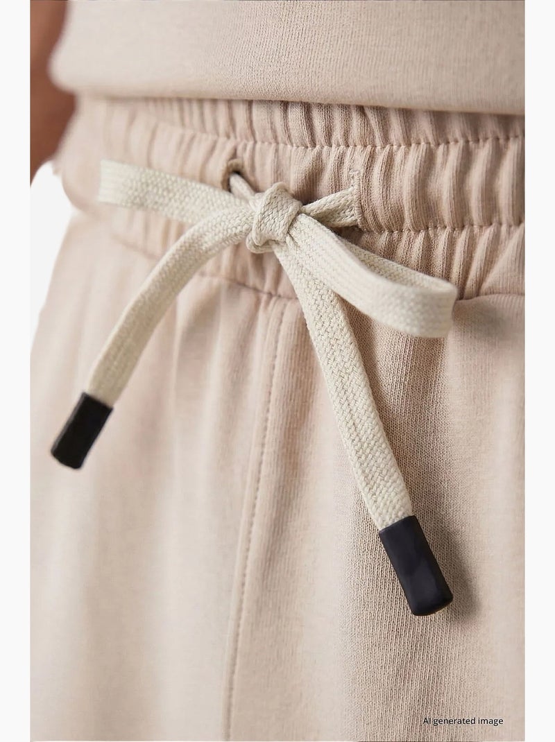 Conjunto active de hombre de poliéster-elastano tommy Beige arcilla - Kiabi