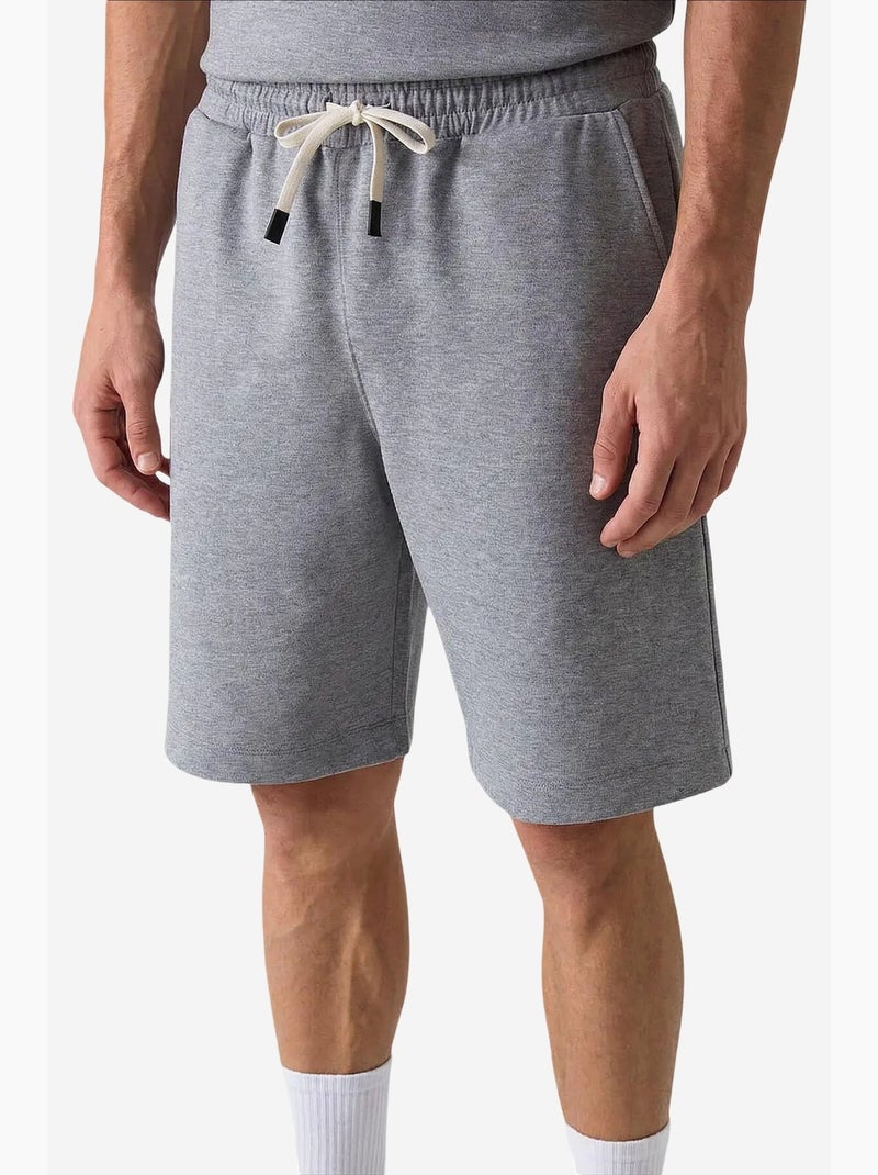 Conjunto active de hombre de poliéster-elastano tommy Gris - Kiabi