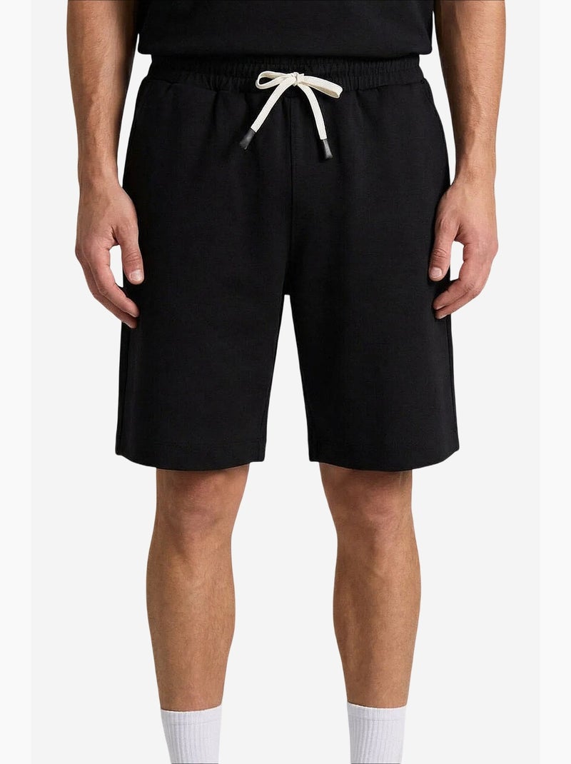 Conjunto active de hombre de poliéster-elastano tommy Negro - Kiabi