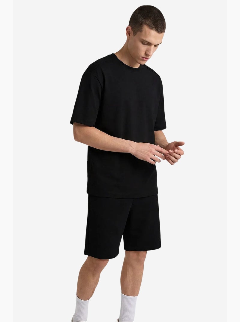 Conjunto active de hombre de poliéster-elastano tommy Negro - Kiabi