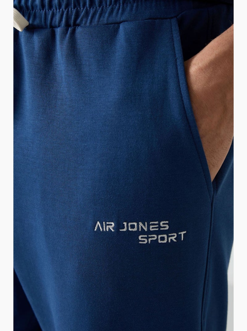 Conjunto active oversize de algodón y poliéster para hombre tommy Azul - Kiabi