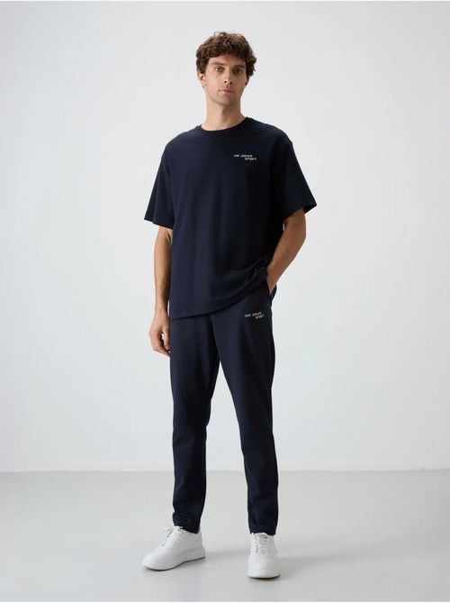 Conjunto active oversize de algodón y poliéster para hombre tommy - Kiabi