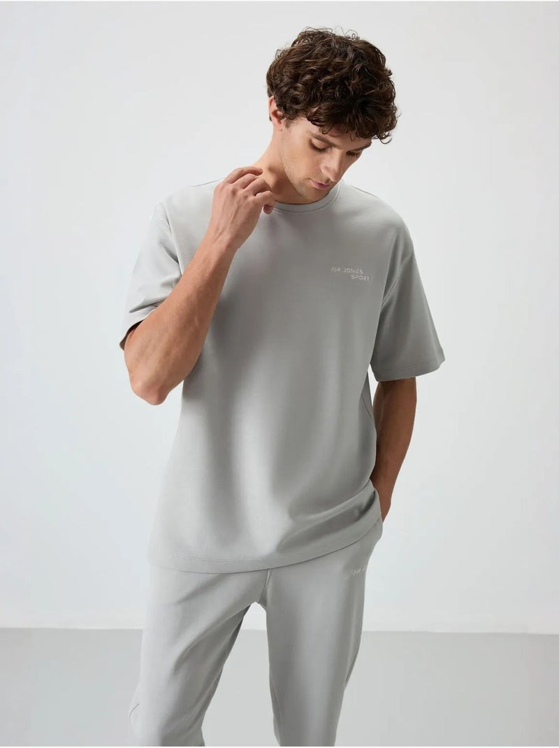Conjunto active oversize de algodón y poliéster para hombre tommy Gris claro - Kiabi