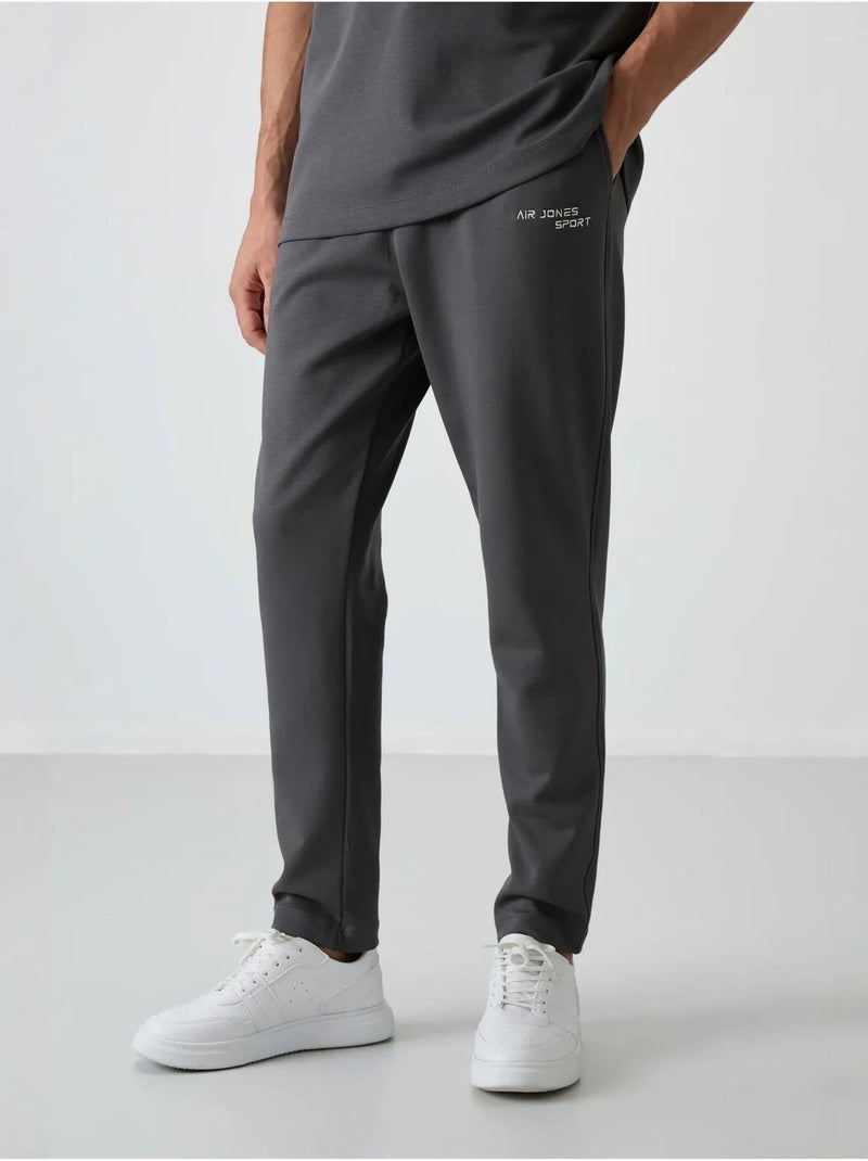 Conjunto active oversize de algodón y poliéster para hombre tommy Gris negro - Kiabi