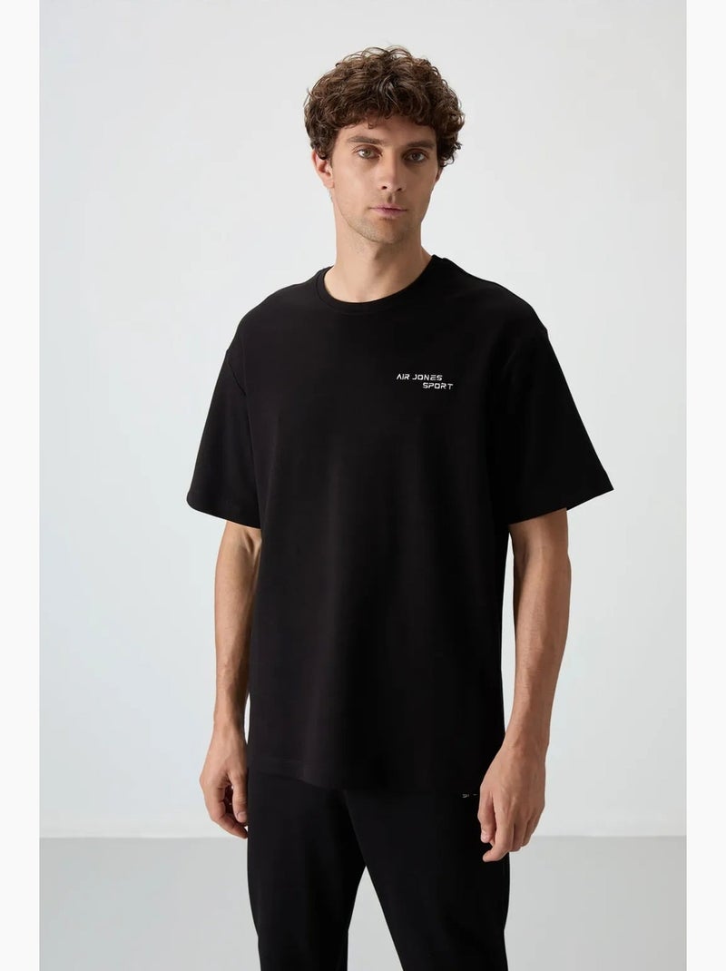 Conjunto active oversize de algodón y poliéster para hombre tommy Negro - Kiabi