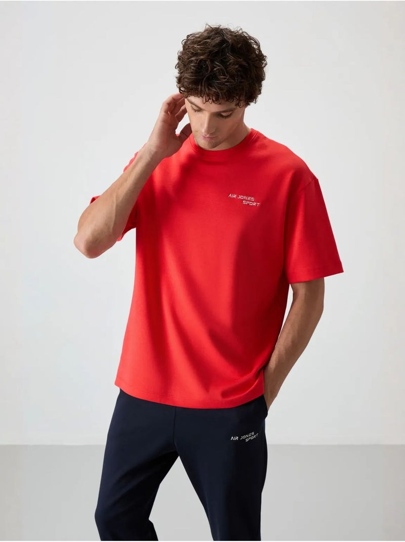 Conjunto active oversize de algodón y poliéster para hombre tommy Rojo - Kiabi
