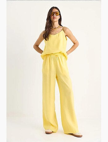 Conjunto coordinado de camisola sin mangas y pantalón de pernera ancha lucci